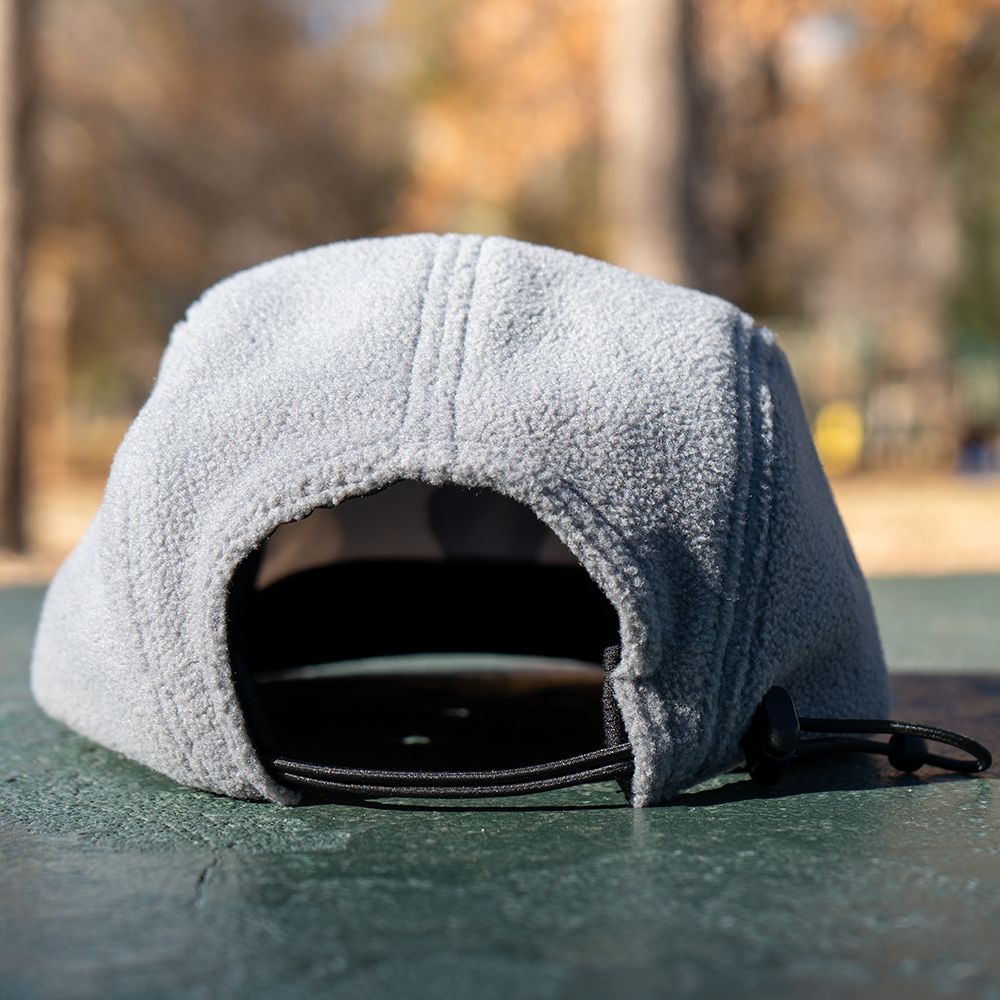 Back view of Skull Flower Fleece 5 Panel hat showing fleece texture and bungee closure