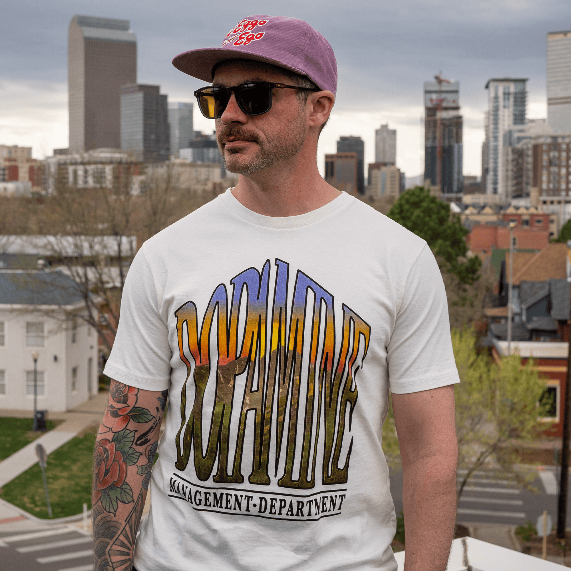 Model Wearing Mountain Sunrise Tee Outdoors