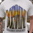 Close-up of Sunrise Design on Unisex Off-White Tee