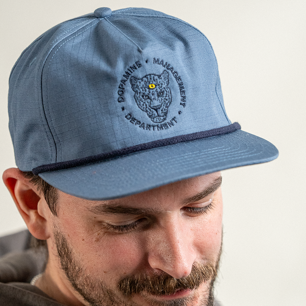 Leopard Cotton Ripstop hat in blue slate on male model
