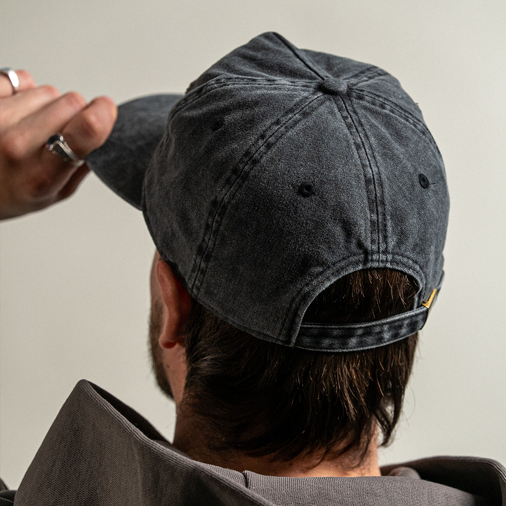 Back view of vintage third eye hat on model.