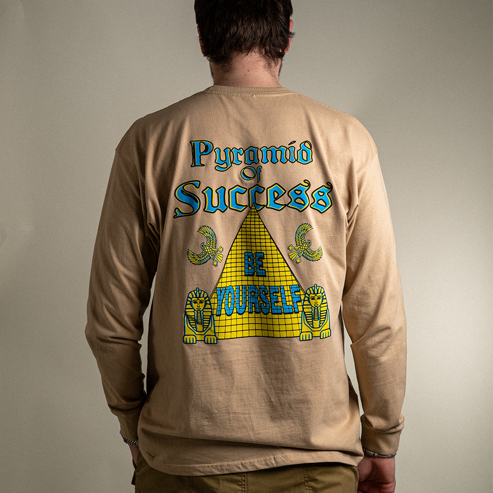Model wearing the Pyramid of Success tee, back view