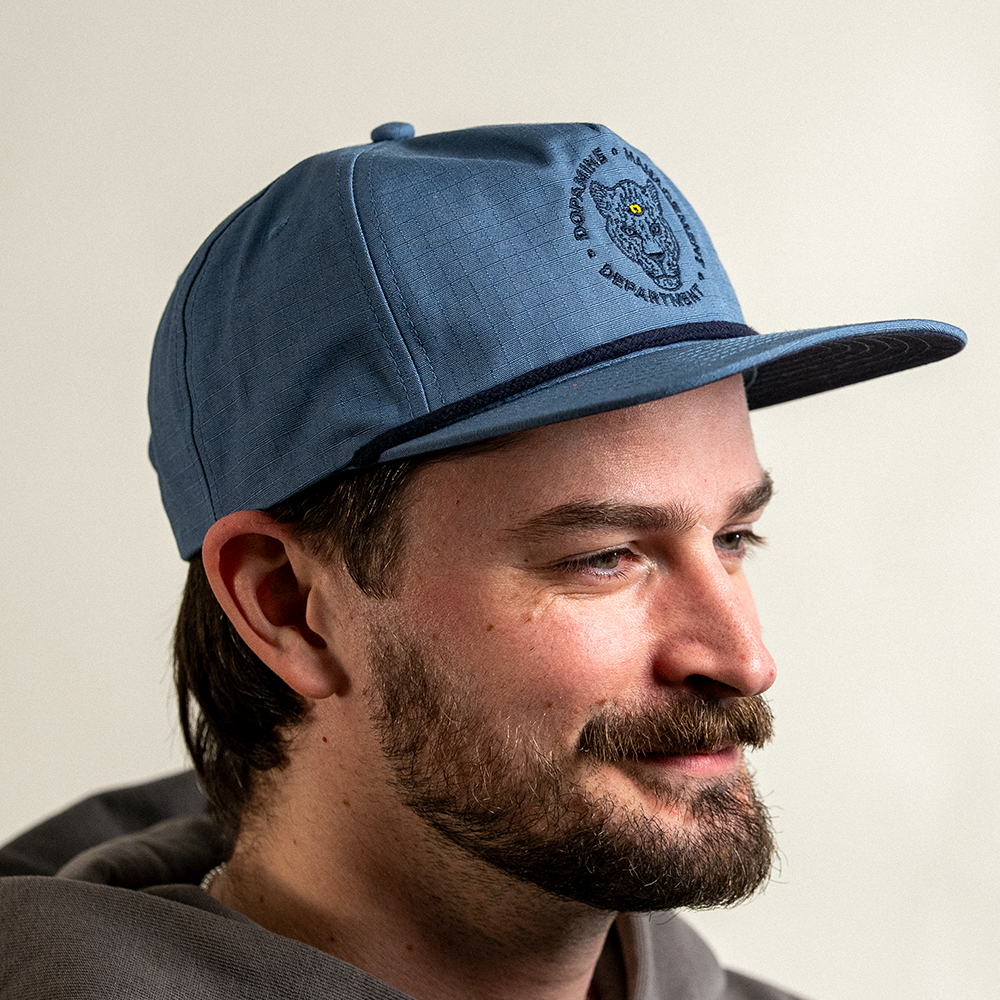 Leopard Cotton Ripstop hat in blue slate on male model