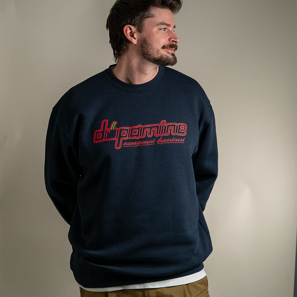 Model wearing navy geometric cherry dopamine heavy crewneck sweater
