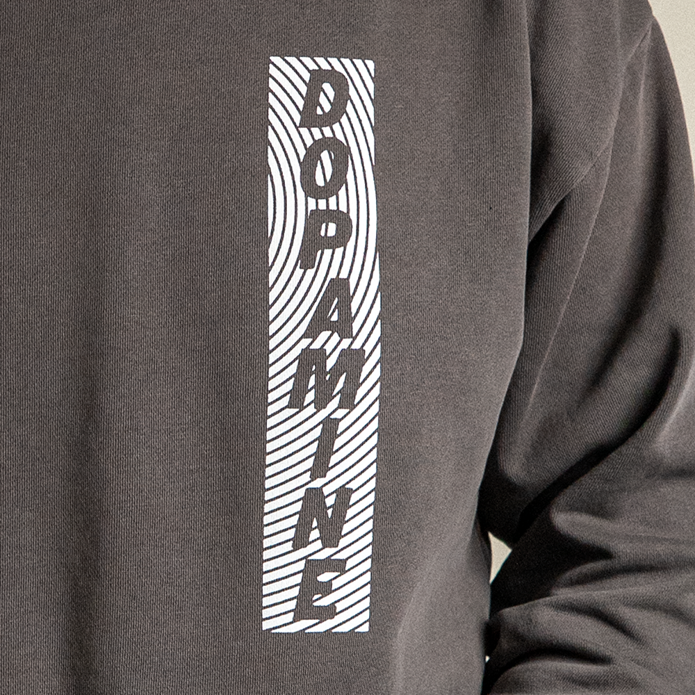 Close up of DOPAMINE design on front of Rose heavyweight hoodie