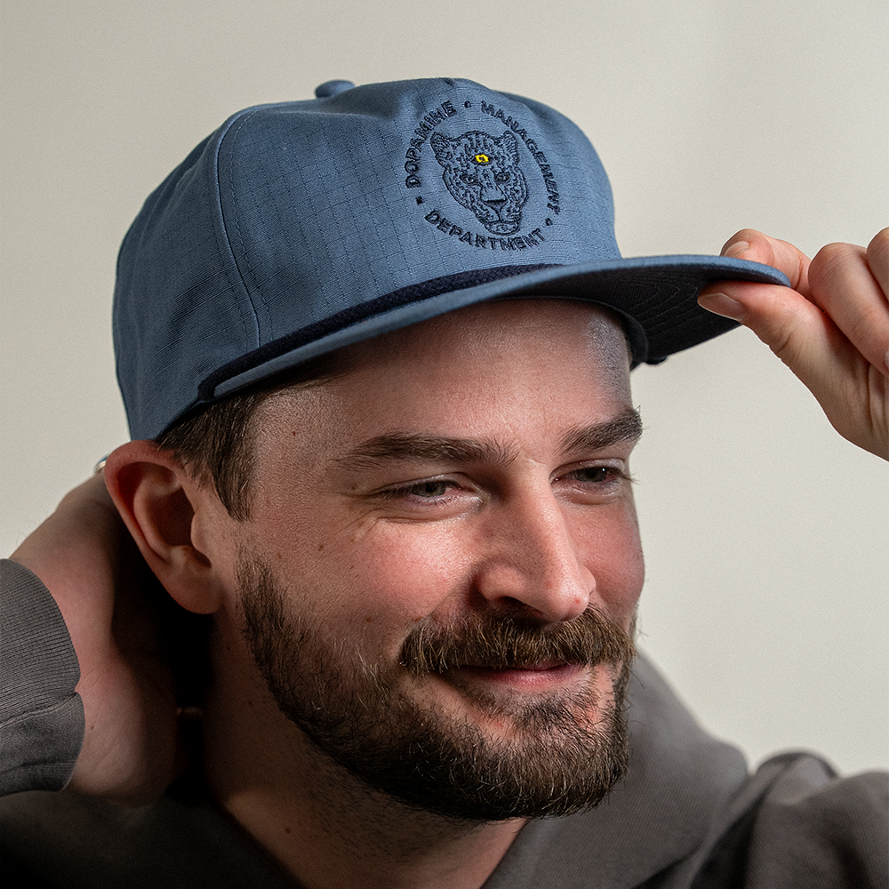 Leopard Cotton Ripstop hat in blue slate on male model