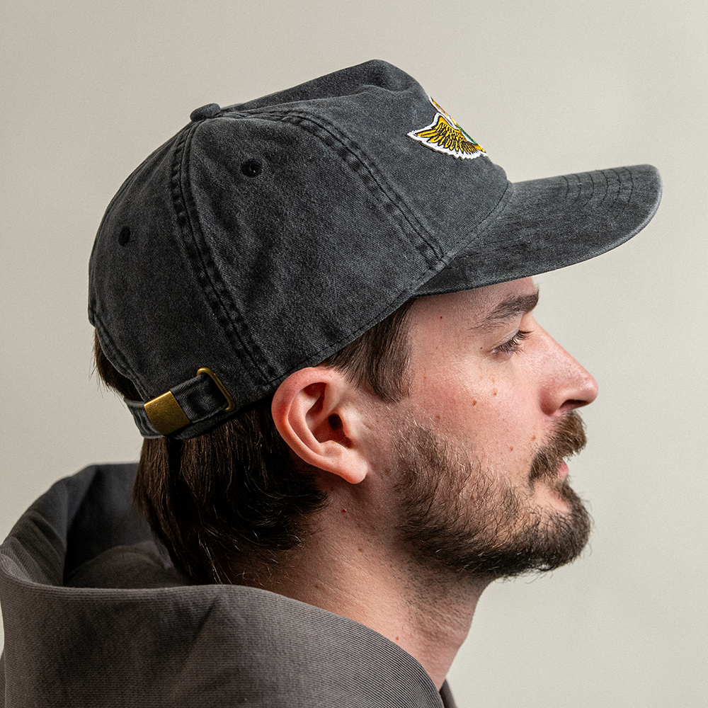 Profile view of Third Eye Vintage Hat on model