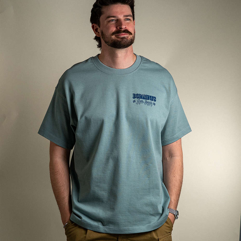 Front view of model wearing What's Under Your Hood Heavy Core Tee