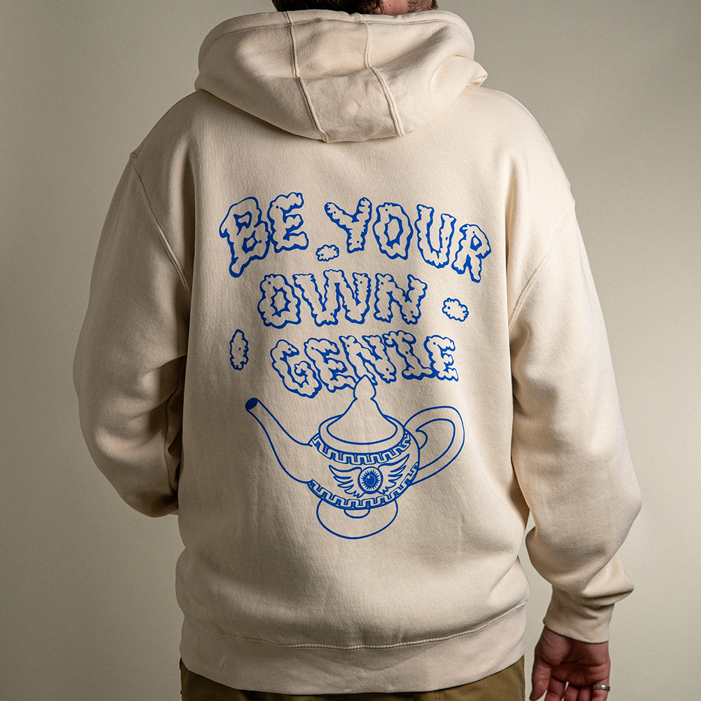 Back view Model wearing Be Your Own Genie zip up hoodie.