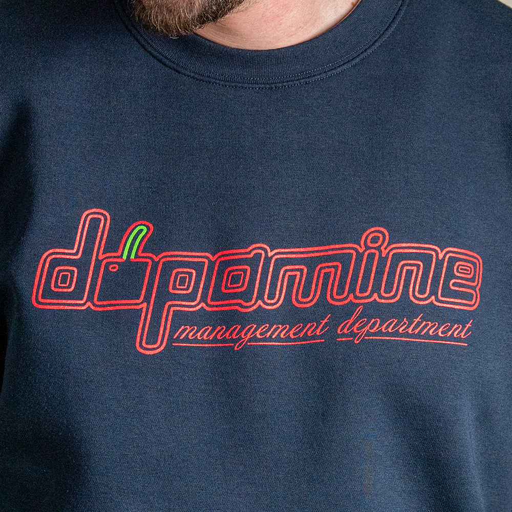 Close up of center chest design on Geo Cherry sweatshirt