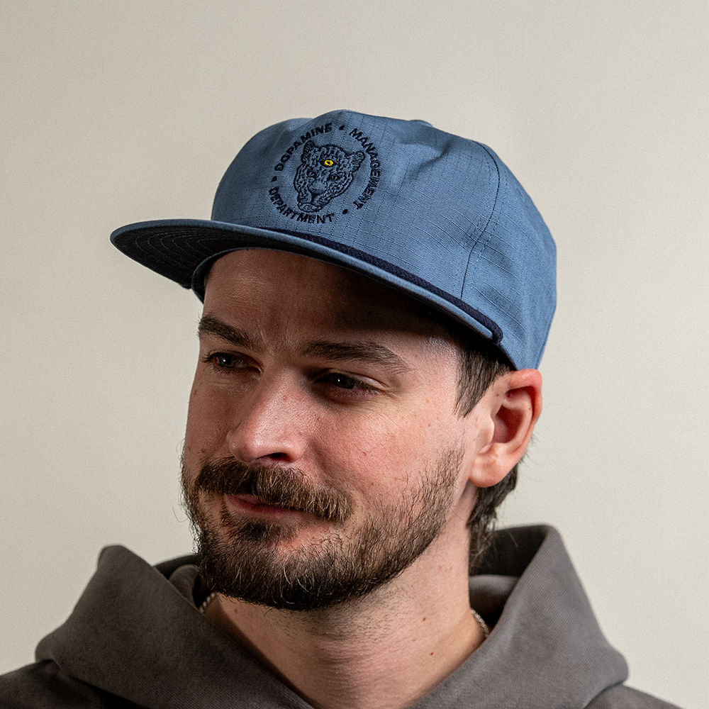 Leopard Cotton Ripstop hat in blue slate on male model