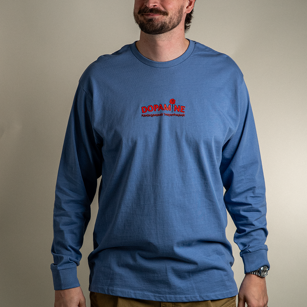 Model wearing Dopamine Management Department Kindness Long Sleeve Tee, side angle view