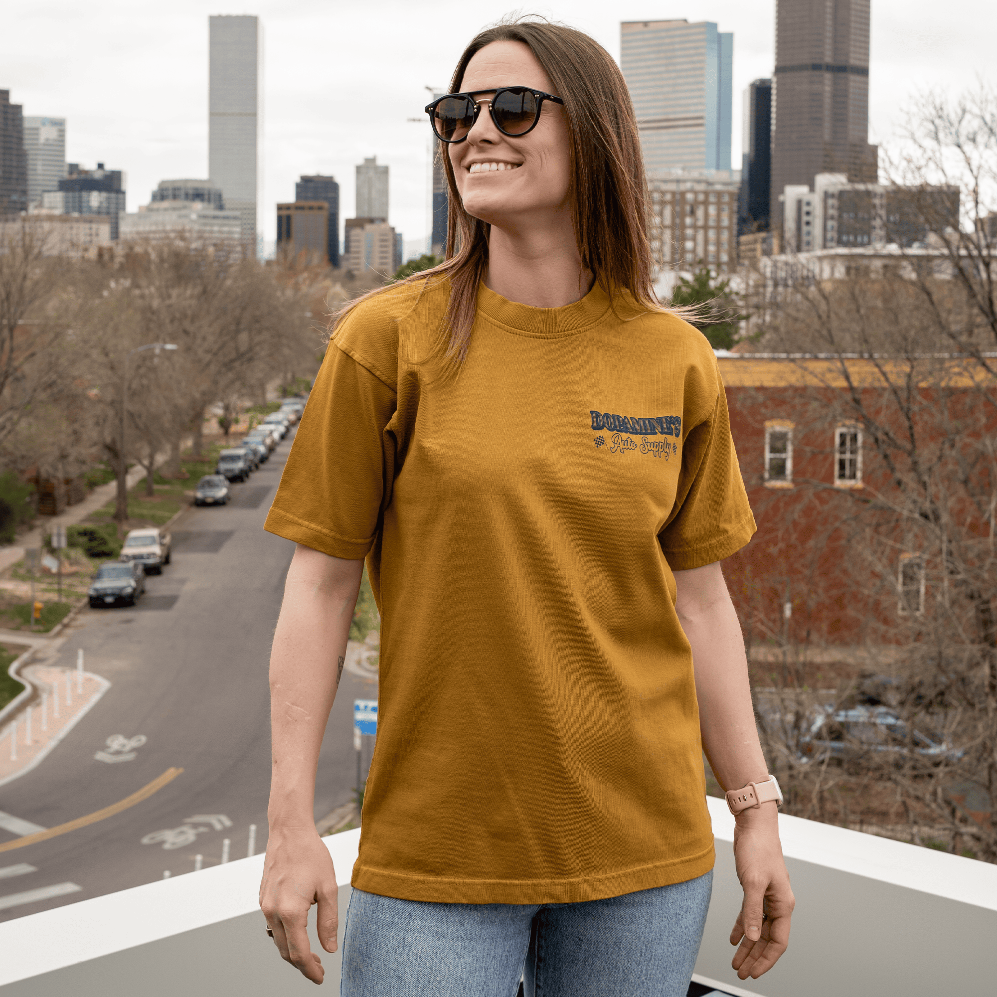 Female model wearing Under the Hood tee size S