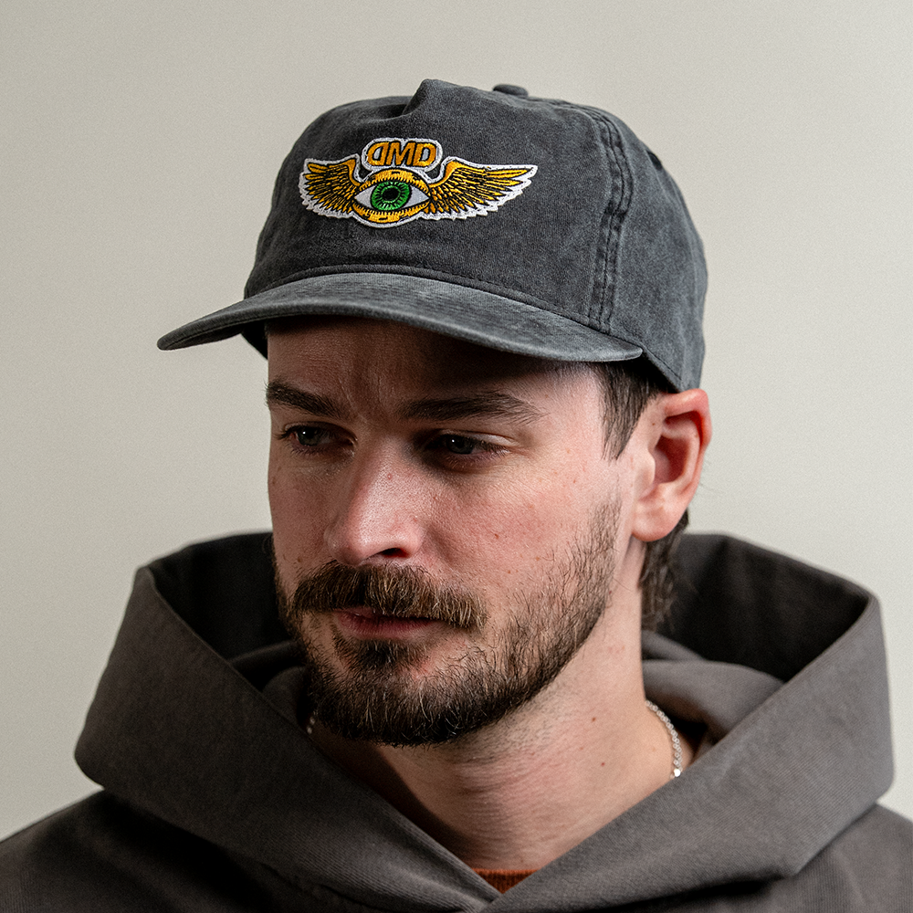 Angled lifestyle product photo of Third Eye Vintage Hat on model