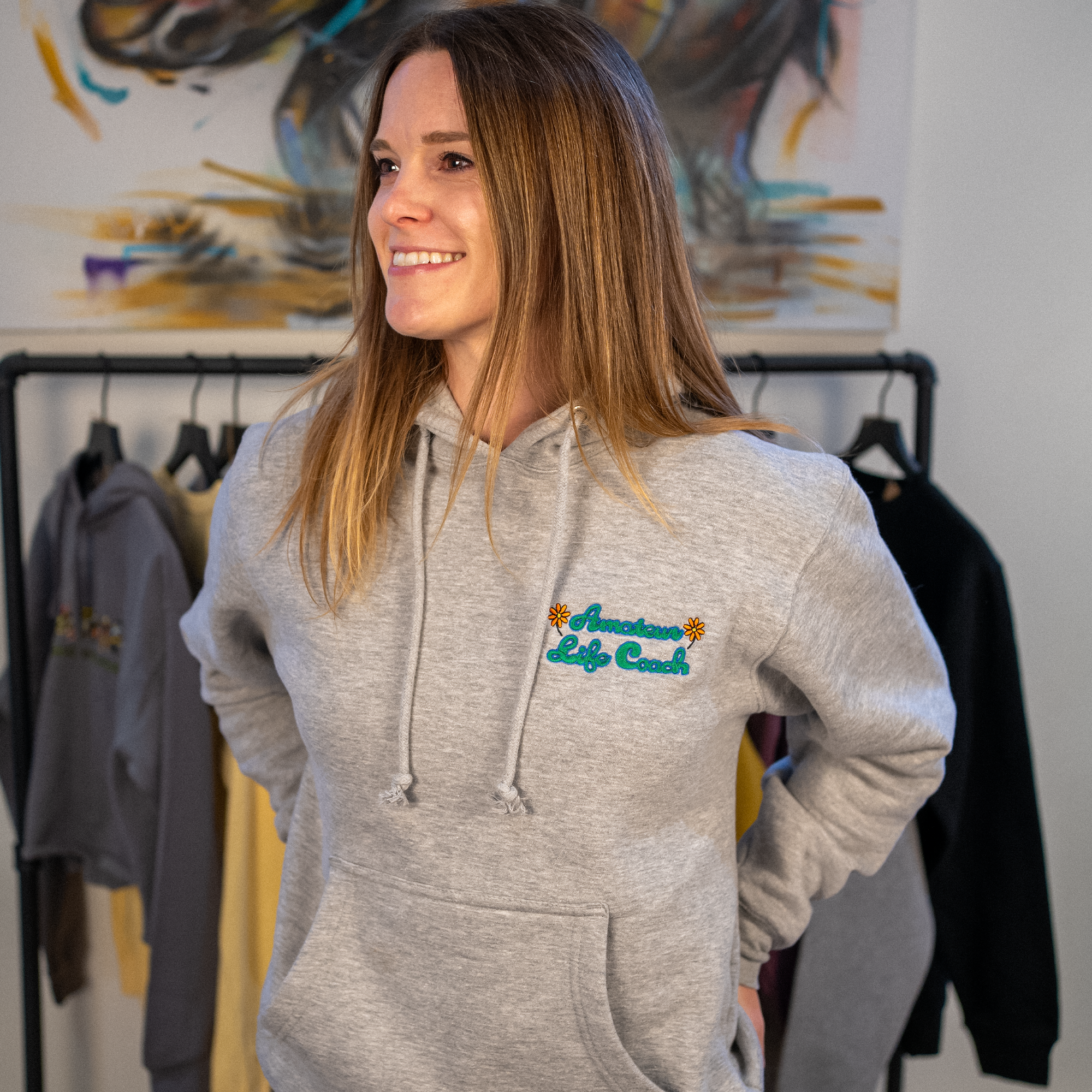 Cozy unisex hoodie with bold text graphic