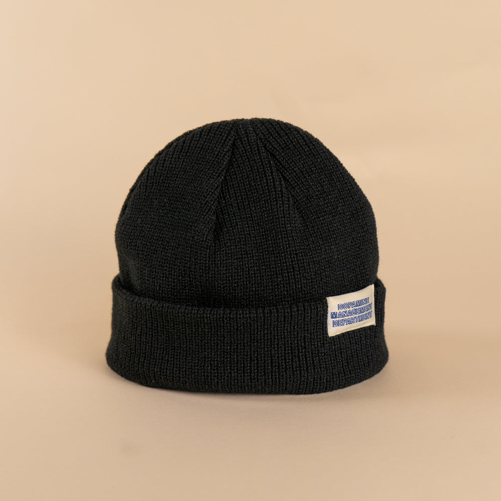 Angled view black shallow fit recycled knit beanie