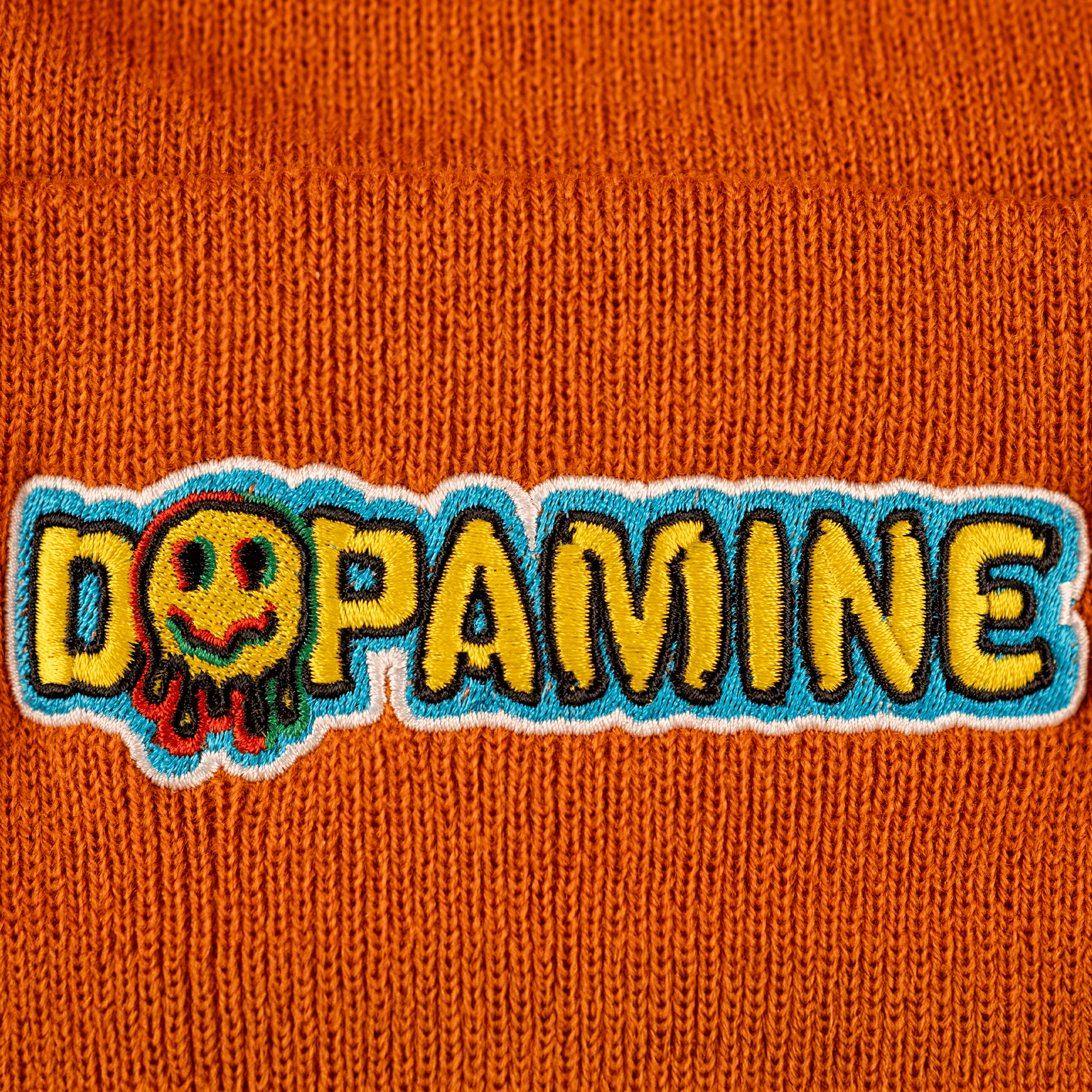 Unisex acrylic beanie with colorful embroidery