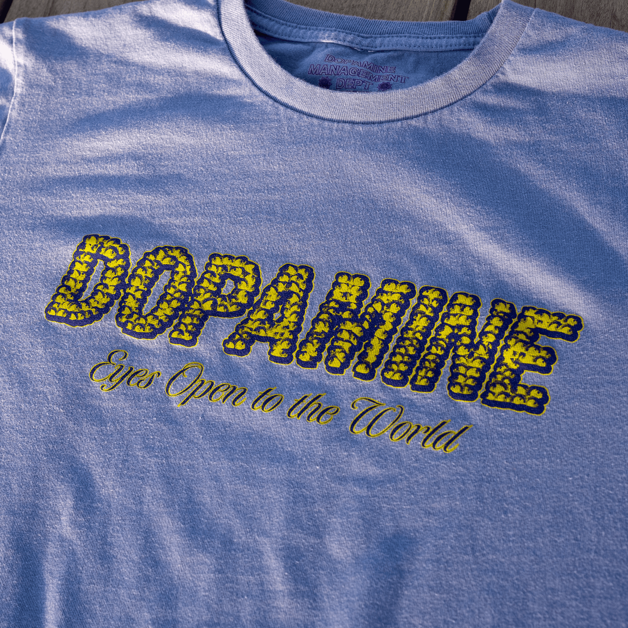 Mental health awareness graphic t-shirt in light blue