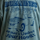 Close up back view of model wearing What's Under Your Hood Heavy Core Tee with oversized back design.