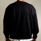 Back of Anxiety is For Everyone sweatshirt in black. 