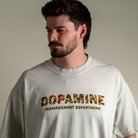 Close up of model wearing Wallflower tee with Dopamine Management Department floral design on heavyweight cotton tee in light grey. 
