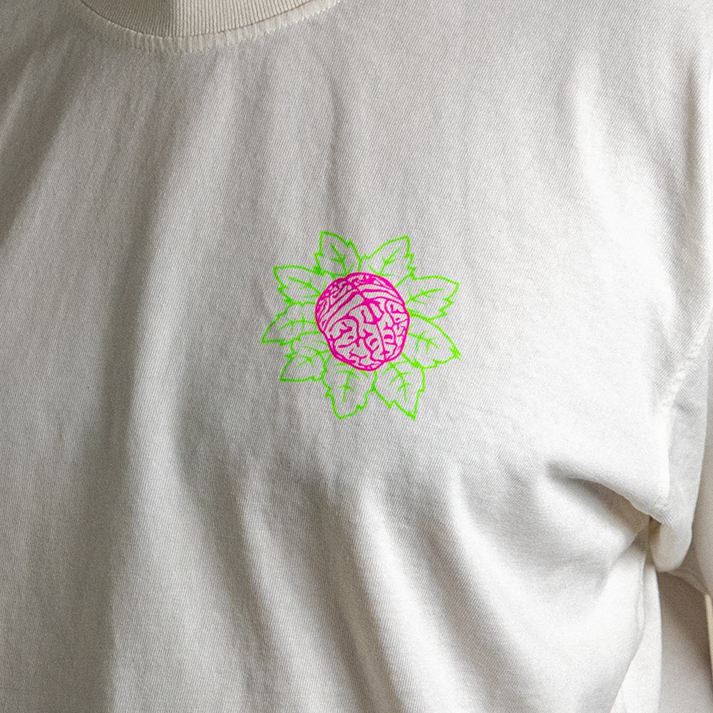 Up close of left chest mindflower icon design.