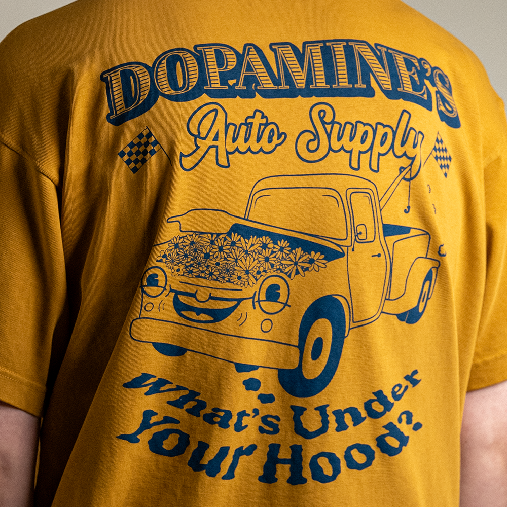 Close up of back design of Under the Hood heavyweight cotton tee in color peanut butter.