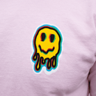 Pink Smily Face T Shirt with Warped Graphic – Front View