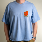 Close Up front view of model wearing Breathe Deep Vibe Deep heavyweight cotton tee. 
