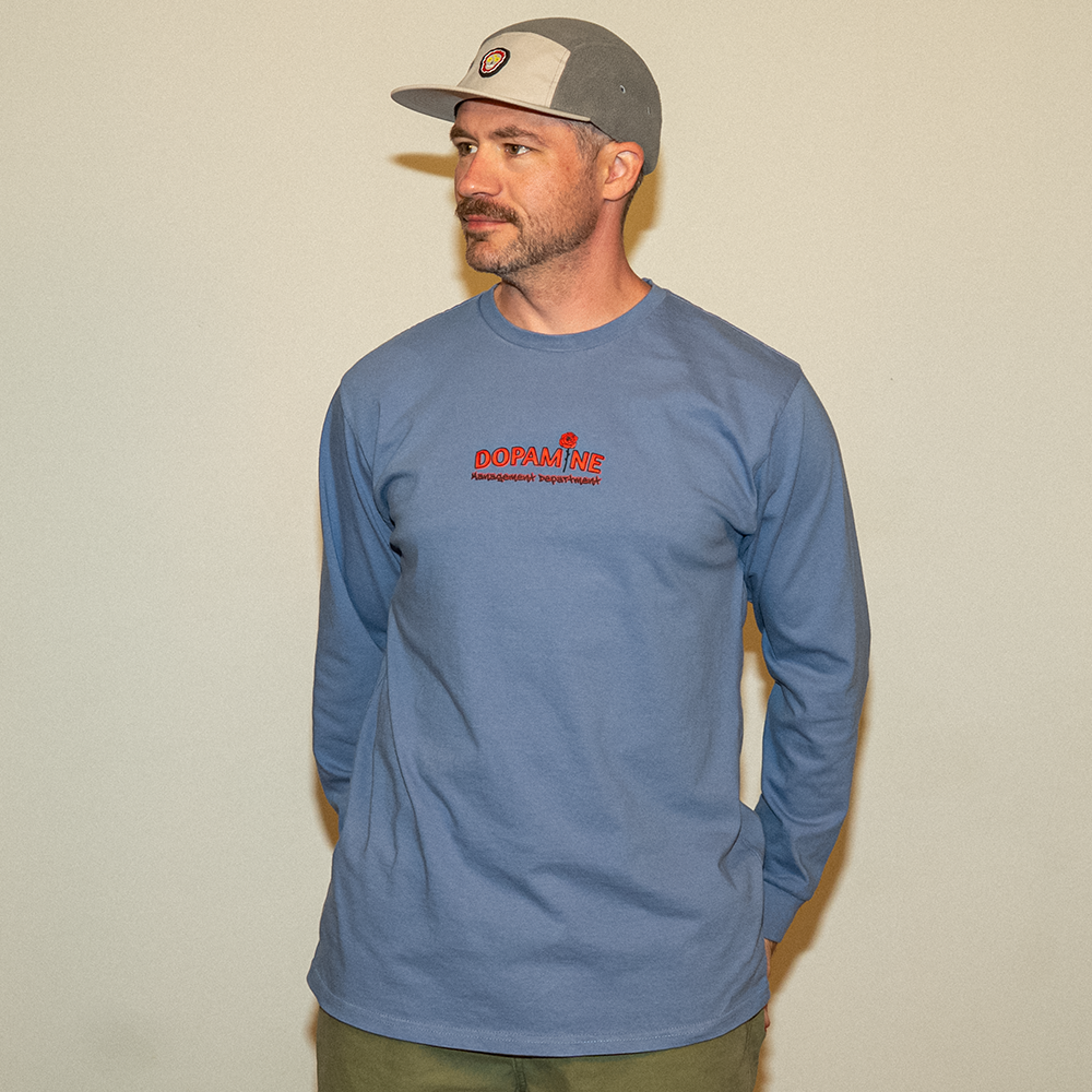 Model wearing Dopamine Management Department Kindness Long Sleeve Tee, side angle view