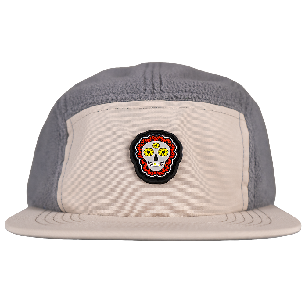 Front view of Skull Flower Fleece 5 Panel hat with PVC skull patch