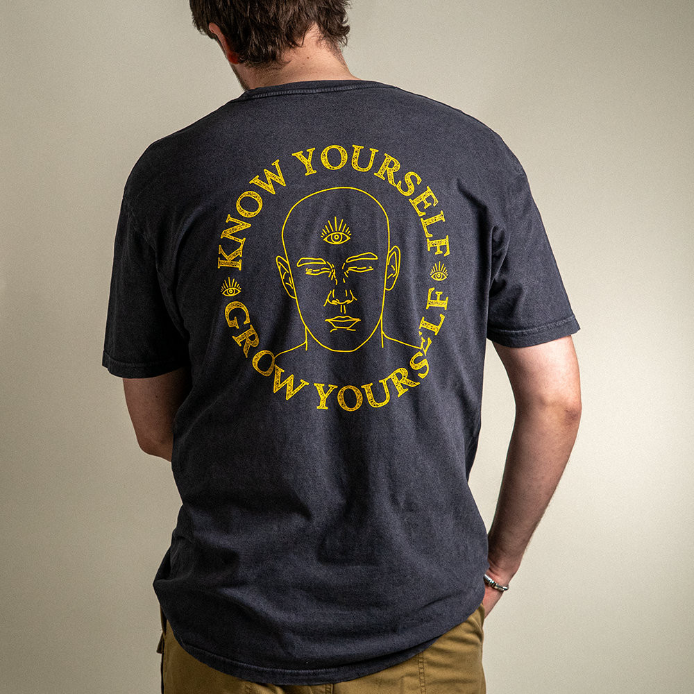Back view of model wearing Know Yourself Grow Yourself distressed vintage Cotton Tee for Men and Women