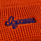 Close-up of orange Script Beanie embroidery detail