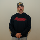 Model in Dopamine Management Department cherry logo sweatshirt