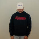 Model in Dopamine Management Department cherry logo sweatshirt