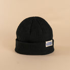 Angled view black shallow fit recycled knit beanie