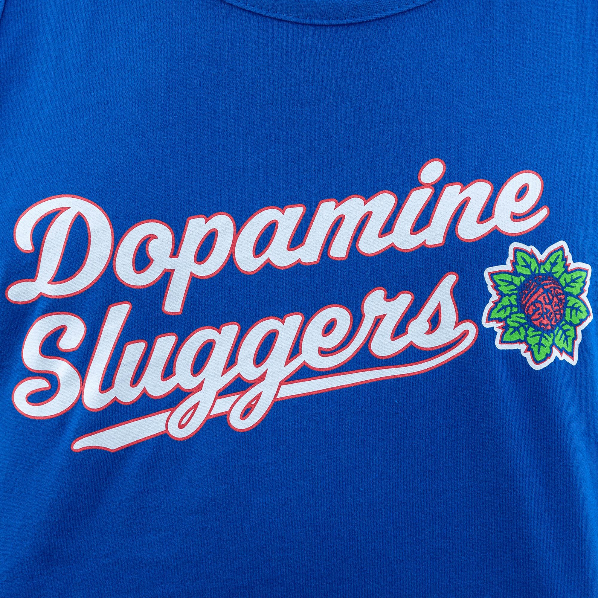 Zoomed-in view of Dopamine Sluggers tank top on model