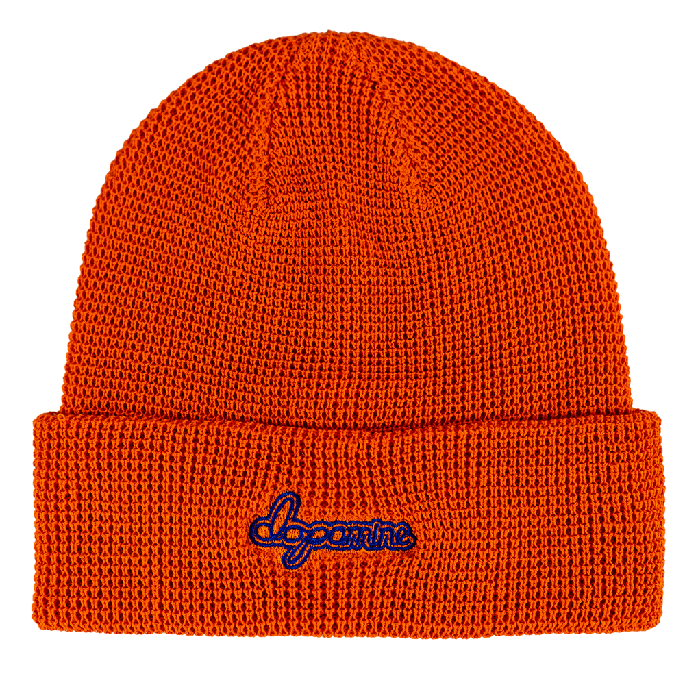 Orange knit beanie with script "dopamine" logo in blue stitching
