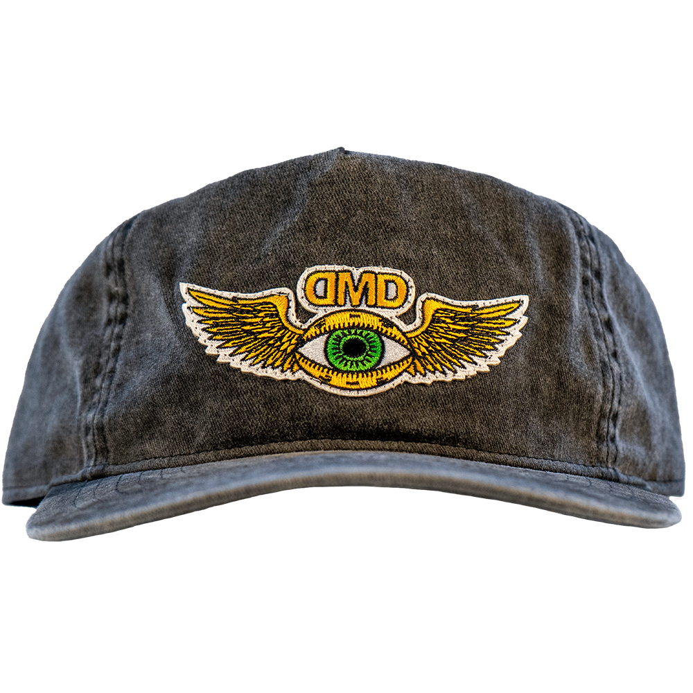 Black vintage wash cap with flying third eye embroidered patch